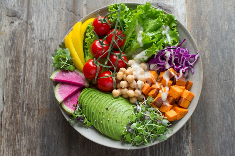 Colourful healthy meal bowl packed with fresh vegetables and grains